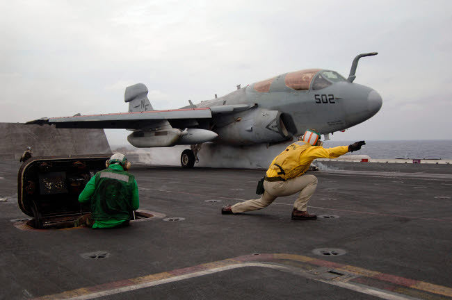 EA-6B Prowler Launching from USS Kitty Hawk Fine Art Print by Stocktrek Images