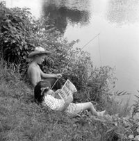 Boy Fishing While Girl Reads Comic Book Fine Art Print