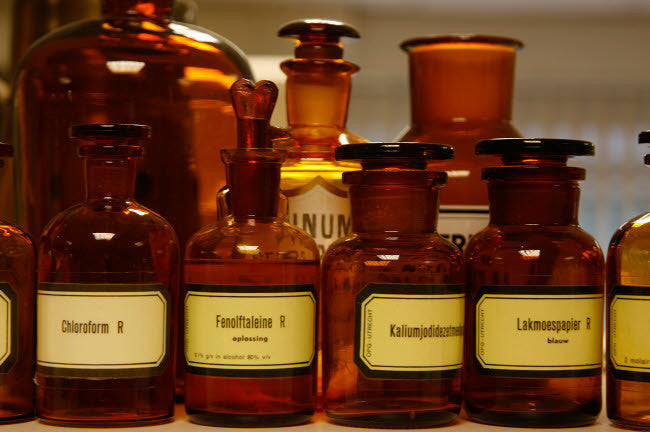 Bottles with Liquid Drugs at a Pharmacy Fine Art Print by VWPics/Stocktrek Images