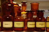 Bottles with Liquid Drugs at a Pharmacy Fine Art Print by VWPics/Stocktrek Images