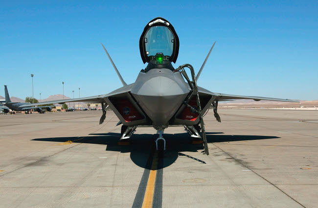 F/A-22 Raptor Parking Ramp Fine Art Print by Stocktrek Images