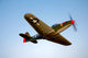 A Bell P-63 Kingcobra in Flight Fine Art Print by Scott Germain