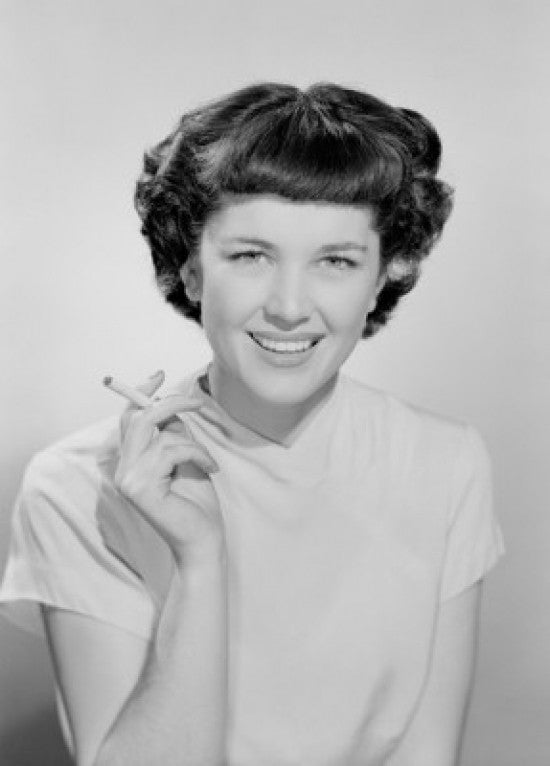 Studio Portrait of a Young Woman Smoking Fine Art Print