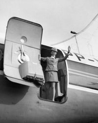 Female Flight Attendant Welcoming You - Airplane Poster Print