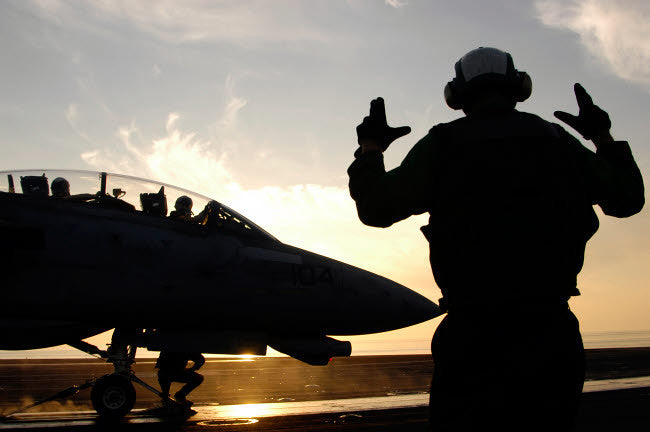 F-14 Tomcat Poster Print Featuring Aircraft Handling Petty Officer by Stocktrek Images