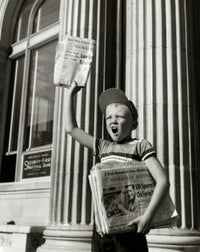 Boy Selling Newspapers in Front of a Building Fine Art Print