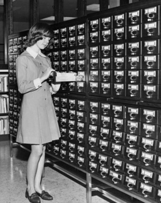 Young Girl Using the Library Card Catalog Fine Art Print