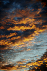 Dramatic Glowing Dark Clouds in the Sky Fine Art Print by Spencer Robertson