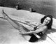 Elaine Stewart - Legs Up in Pool Photo Print