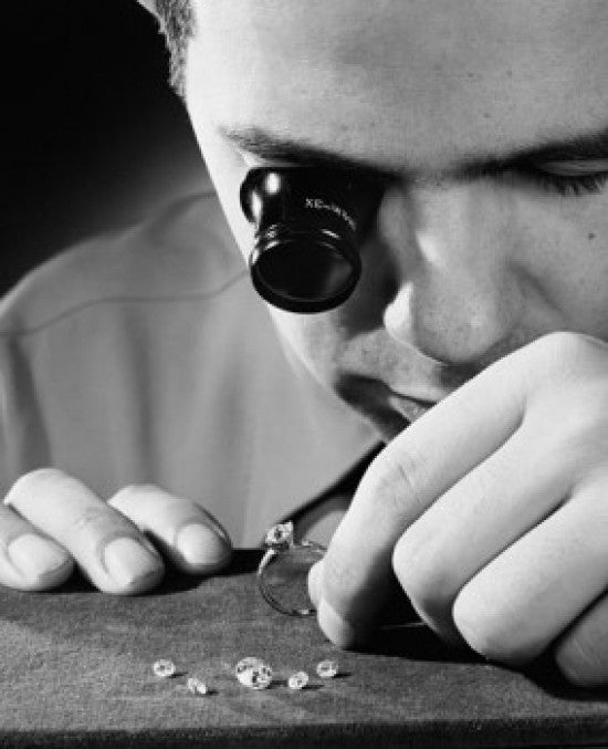 Close-up Fine Art Print of a Man Inspecting Diamonds