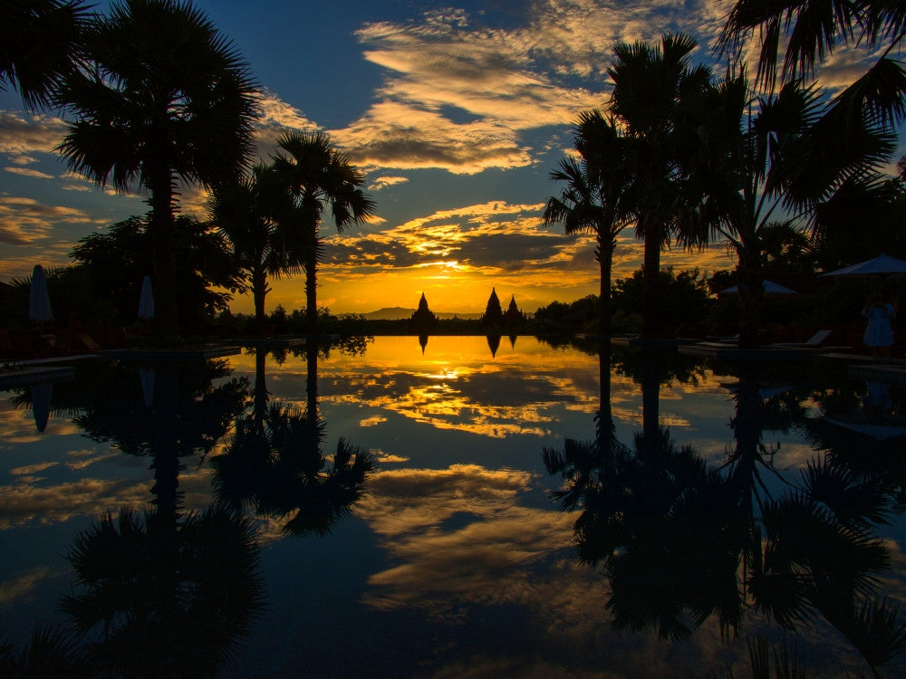Sunset Reflection in Infinity Pool at Aureum Palace Hotel Fine Art Print by Panoramic Images