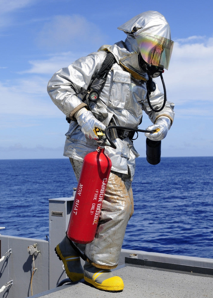 Firefighter with CO2 Extinguisher on USS Denver Flight Deck Poster Print