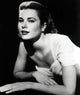 Grace Kelly Laying on Stomach in White Dress Photo Print