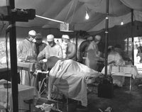 U.S. Navy Medical Team Assists Wounded Marines at Cape Gloucester - Historical Poster Print