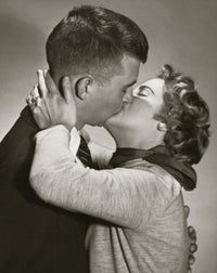 Side Profile of a Young Couple Kissing Fine Art Print