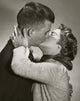 Side Profile of a Young Couple Kissing Fine Art Print