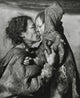 Mid Adult Eskimo Woman and Daughter Rubbing Noses Fine Art Print