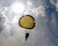 A Paratrooper Descends Through the Sky Fine Art Print by Stocktrek Images