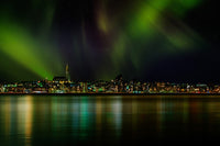 Aurora Borealis Over Reykjavik Skyline Poster Print by Panoramic Images