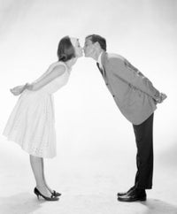 Couple Bending Down to Kiss Fine Art Print
