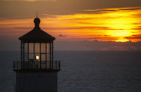 A Sunset at North Head Lighthouse Fine Art Print by Robert L. Potts
