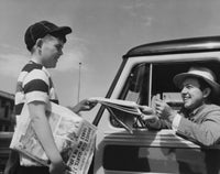 Young Man Buying a Newspaper from a Paper Delivery Boy Fine Art Print
