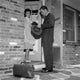 Salesman with Woman at Front Door Fine Art Print