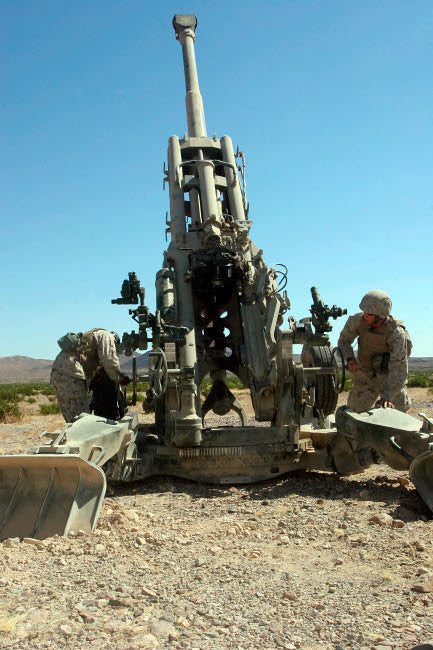 Artillerymen Operating the M777 Lightweight Howitzer Fine Art Print by Stocktrek Images