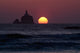 Sunset at Tillamook Rock Lighthouse Fine Art Print by Robert L. Potts