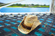 A Sunhat on a Catamaran Hammock - Hawaii Poster Print by Kicka Witte
