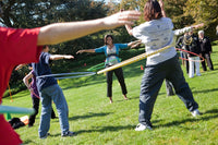 Michelle Obama Hula Hooping with Kids at the White House - Poster Print