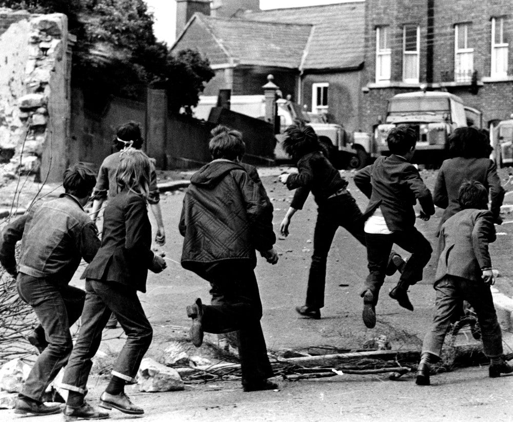 Irish Children Throwing Rocks at British Armored Car Poster Print