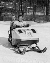 Mid Adult Couple Snowmobiling Fine Art Print