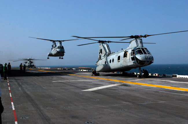 US Marine Corps CH-46 Sea Knight Helicopters Poster Print by Stocktrek Images