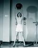 Young Woman Holding Fitness Ball in Gym Poster Print