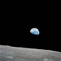 Earth Rising Above the Lunar Horizon Fine Art Print by Stocktrek Images