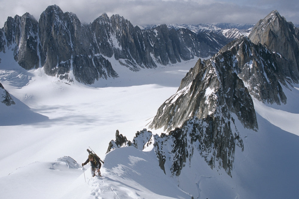 Mountaineer Climbing on Narrow Ridge in Kichatna Mountains Fine Art Print by Chris Flowers