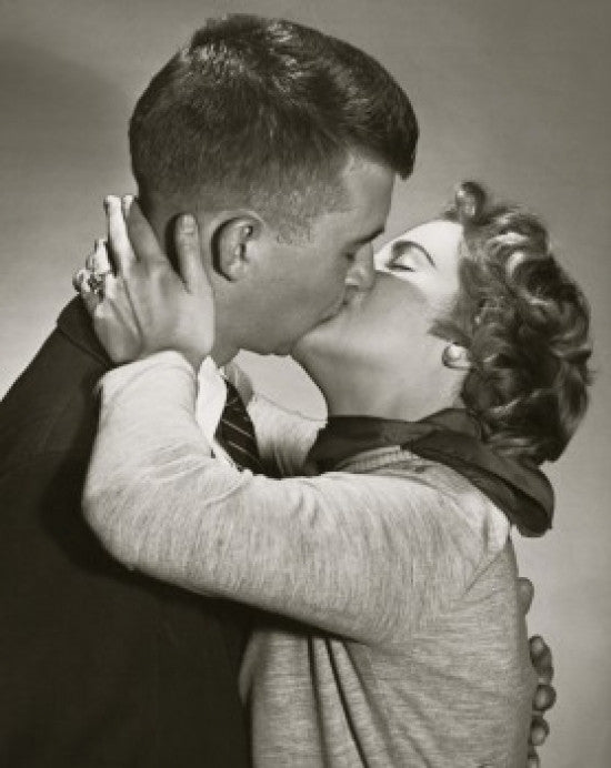 Side Profile of a Young Couple Kissing Fine Art Print