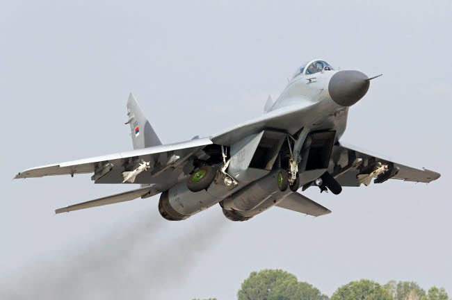 Serbian Air Force MiG-29 with AA-8 Aphid Missiles Fine Art Print by Anton Balakchiev