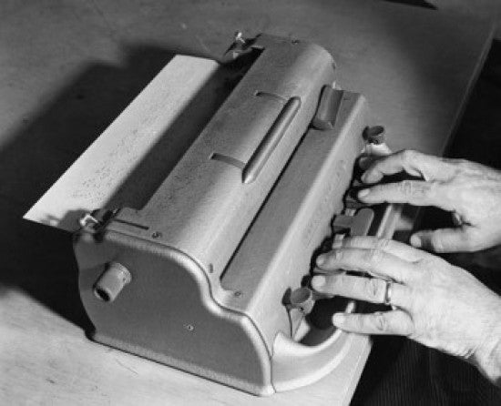 Close-Up of a Hand on a Braille Typewriter Fine Art Print