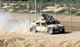 A M1114 Humvee Patrols Joint Base Balad, Iraq Fine Art Print by Stocktrek Images
