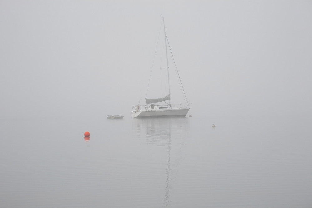Sailboat Moored in the Fog Fine Art Print by David Chapman