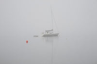 Sailboat Moored in the Fog Fine Art Print by David Chapman