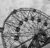 Ferris Wheel Against Cloudy Sky Fine Art Print