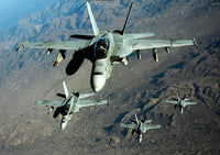 Four US Navy F/A-18 Hornet Aircraft Over Afghanistan Fine Art Print by Stocktrek Images