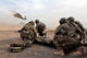 Security Force Team Members Awaiting UH-60 Blackhawk MedEvac Print by Stocktrek Images