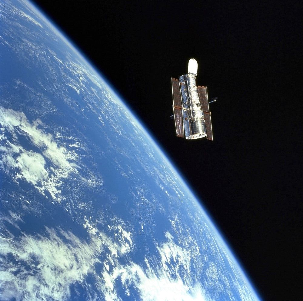 The Hubble Space Telescope Fine Art Print with Earth Background
