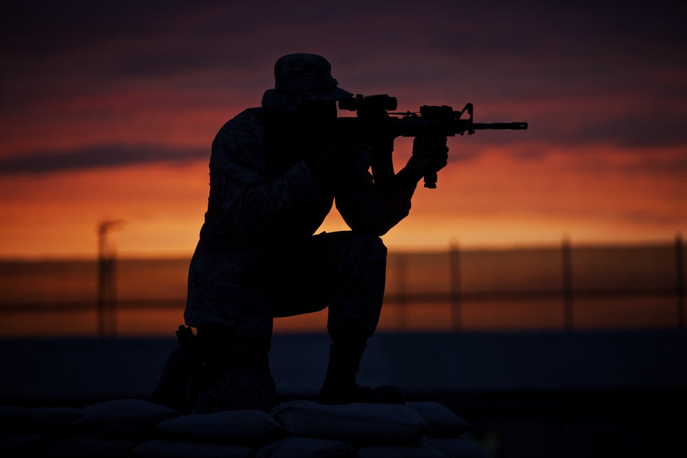 Silhouette of a U.S. Marine at Sunset in Afghanistan Fine Art Print