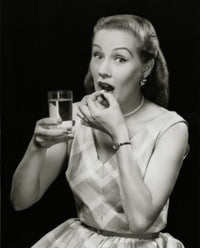 Portrait of a Young Woman Taking a Pill Fine Art Print