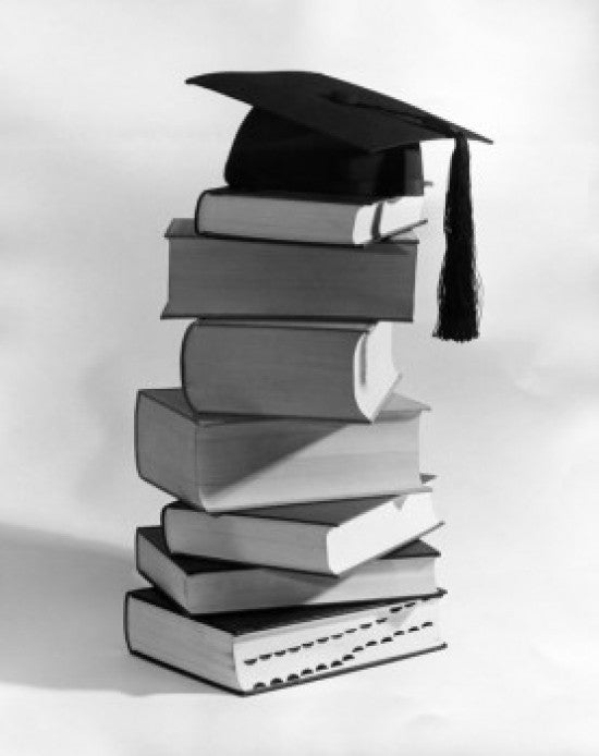 Close-up of Books with Mortar Board Fine Art Print
